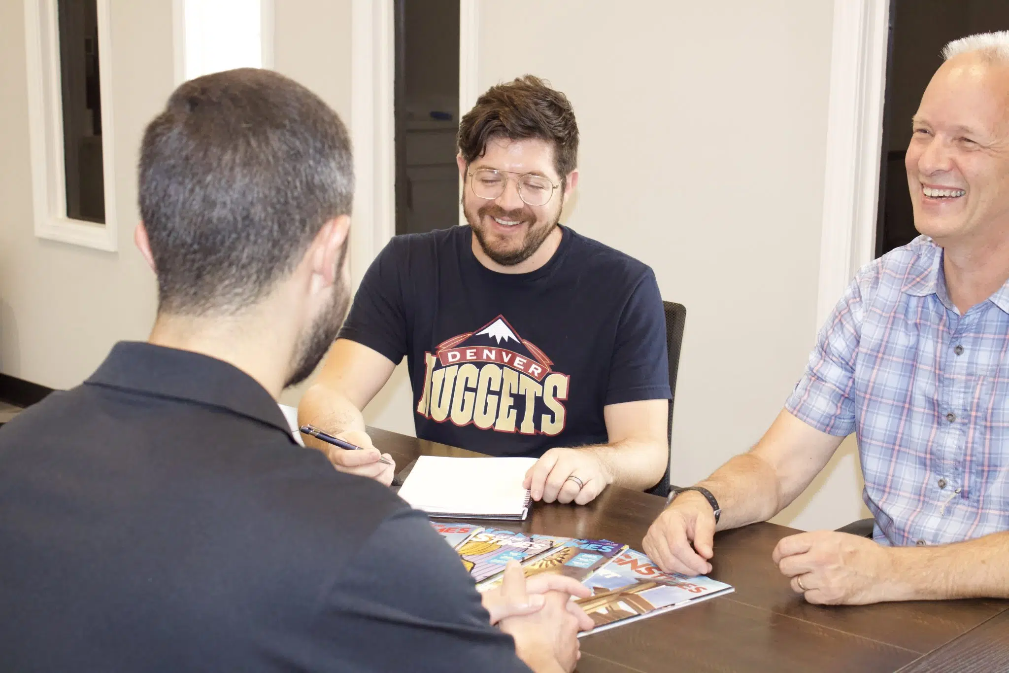 Visual Impression Sign Solutions Team meeting with a client in Chattanooga TN