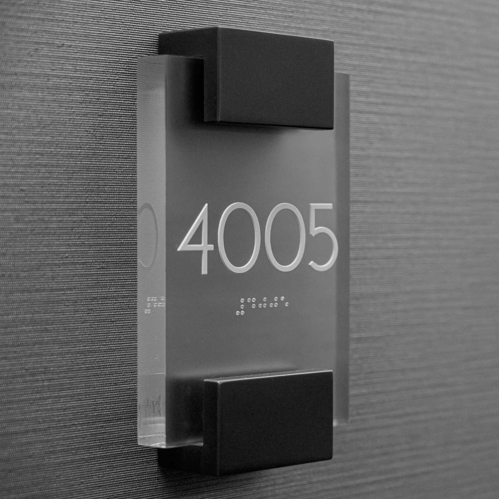 ADA Signs, Visual Impression Sign Solutions, Chattanooga TN ADA Signs with room number and braille from Visual Impression Sign Solutions in Chattanooga TN